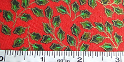 Cotton Christmas fabric - holly leaves on red background