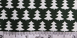 Cotton Christmas fabric - white trees on green background