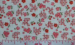 Cotton fabric with tiny flowers and noughts and crosses pattern