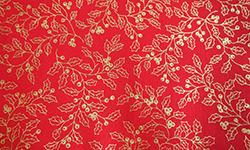 Christmas cotton, gold holly on red background