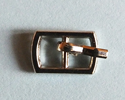 Silver buckle with a hinged pin